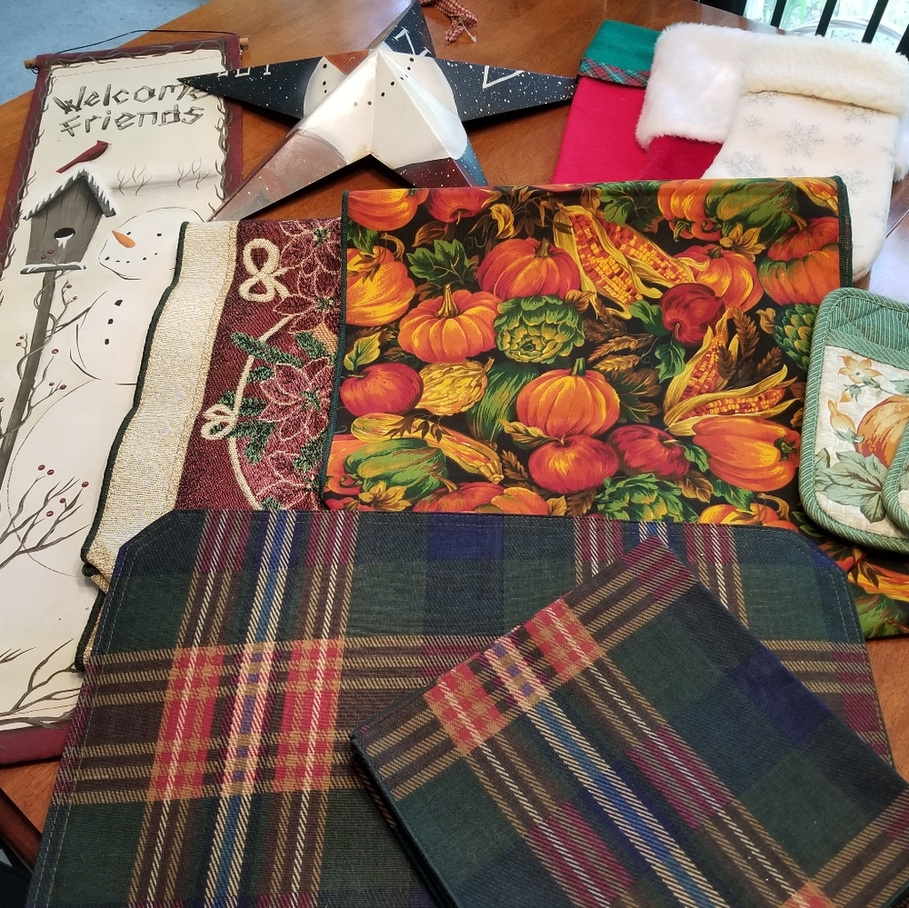 Collection of holiday linens and wall hangings